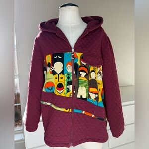 Burgundy quilt-like zip up hoodie with unique character print